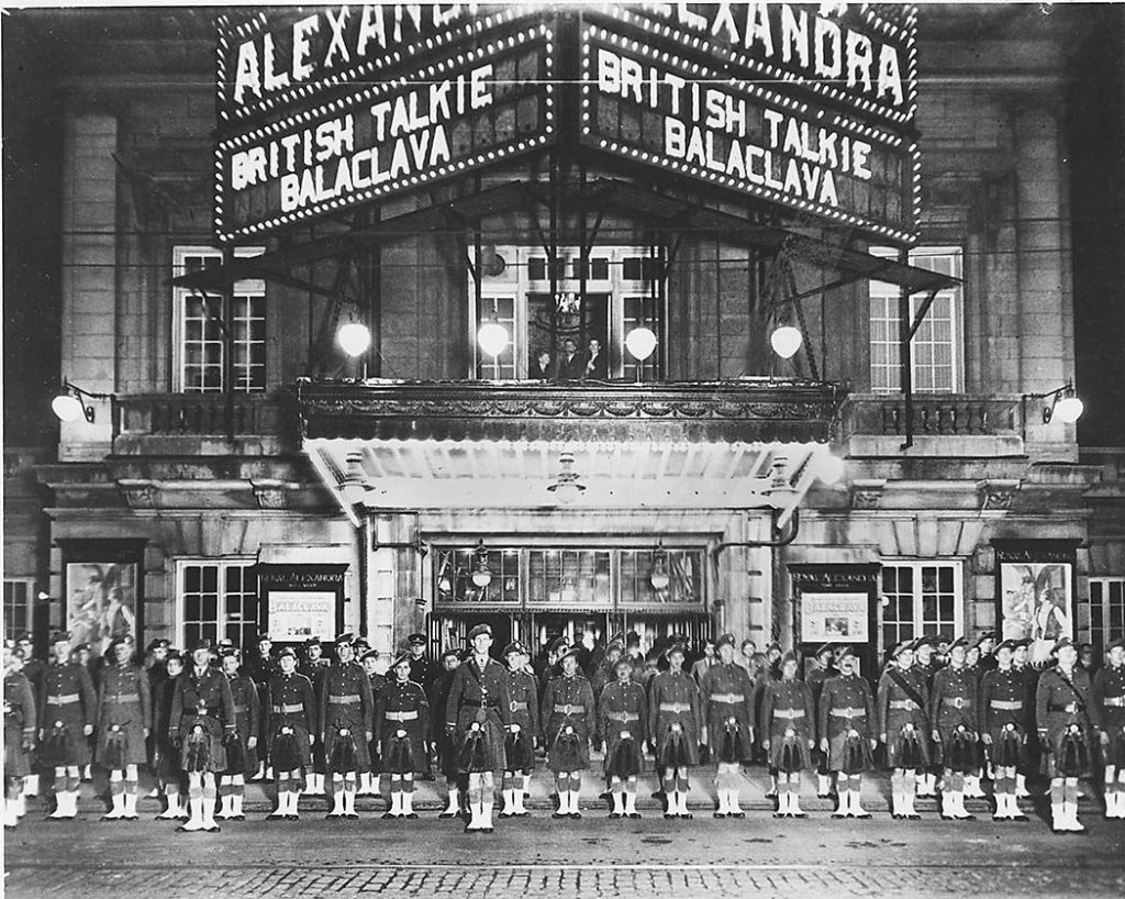 Soldiers at Royal Alexandra Theatre, Toronto, Canada, which is showing the British film Balaclava (1928) after it was reissued as a talkie