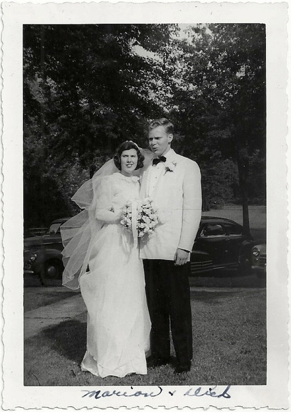 1950s vintage wedding photo of the bride and the groom