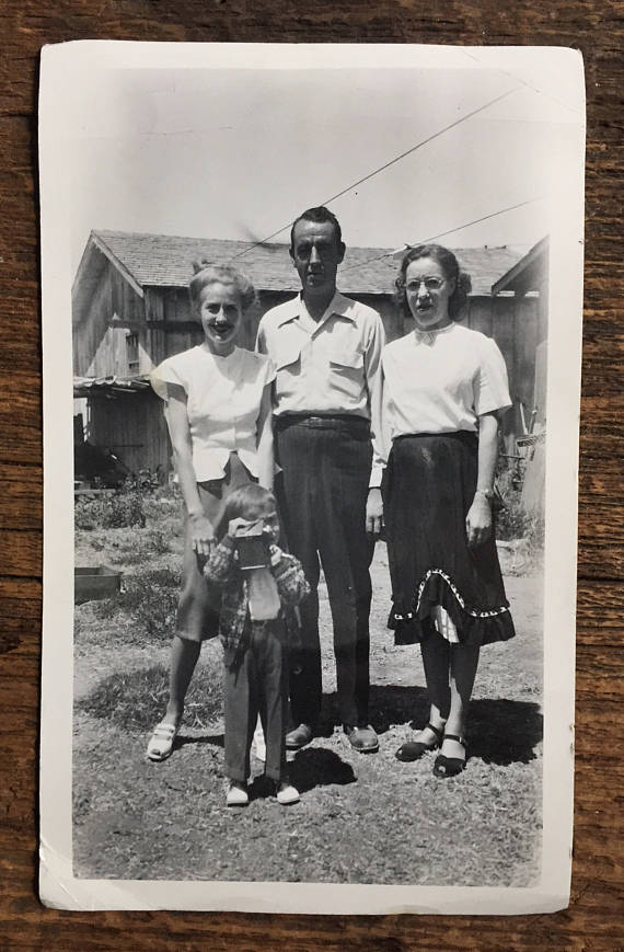 1940s vintage photo of father with his family