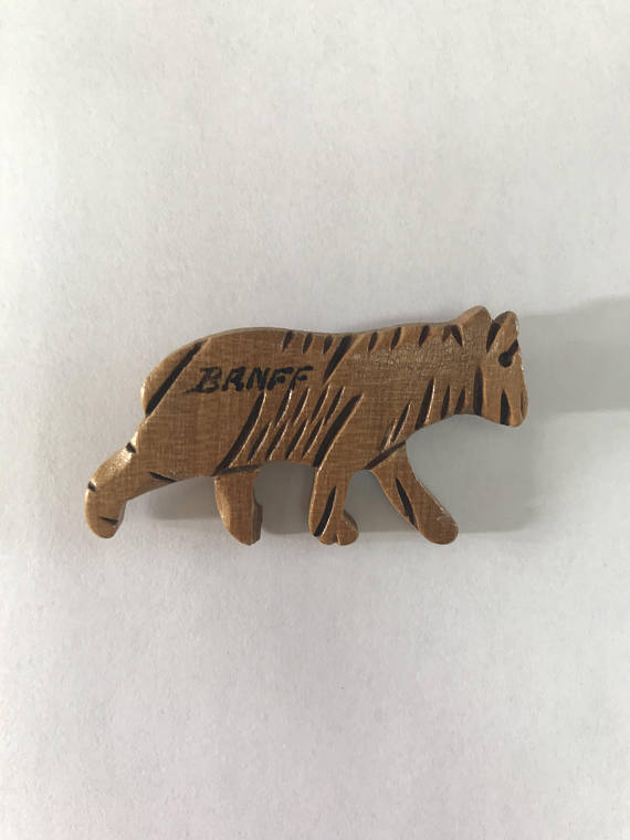 1950s vintage wooden brooch of a bear and advertising Banff, Alberta Canada