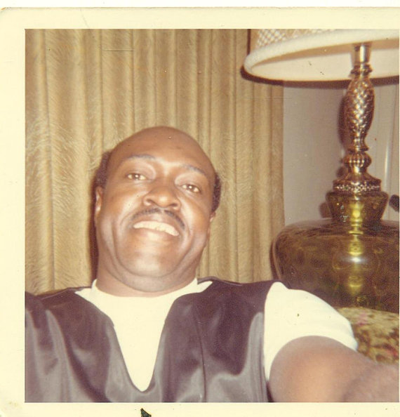 1960s vintage photo of a Black man doing a selfie