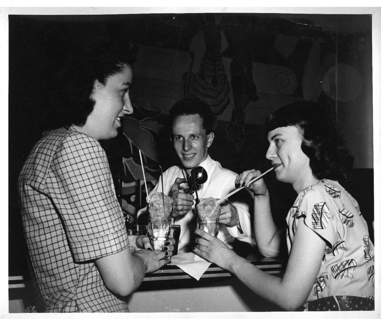 Having drinks at a soda fountain -Late 1940s early 1950s student life vintage photo