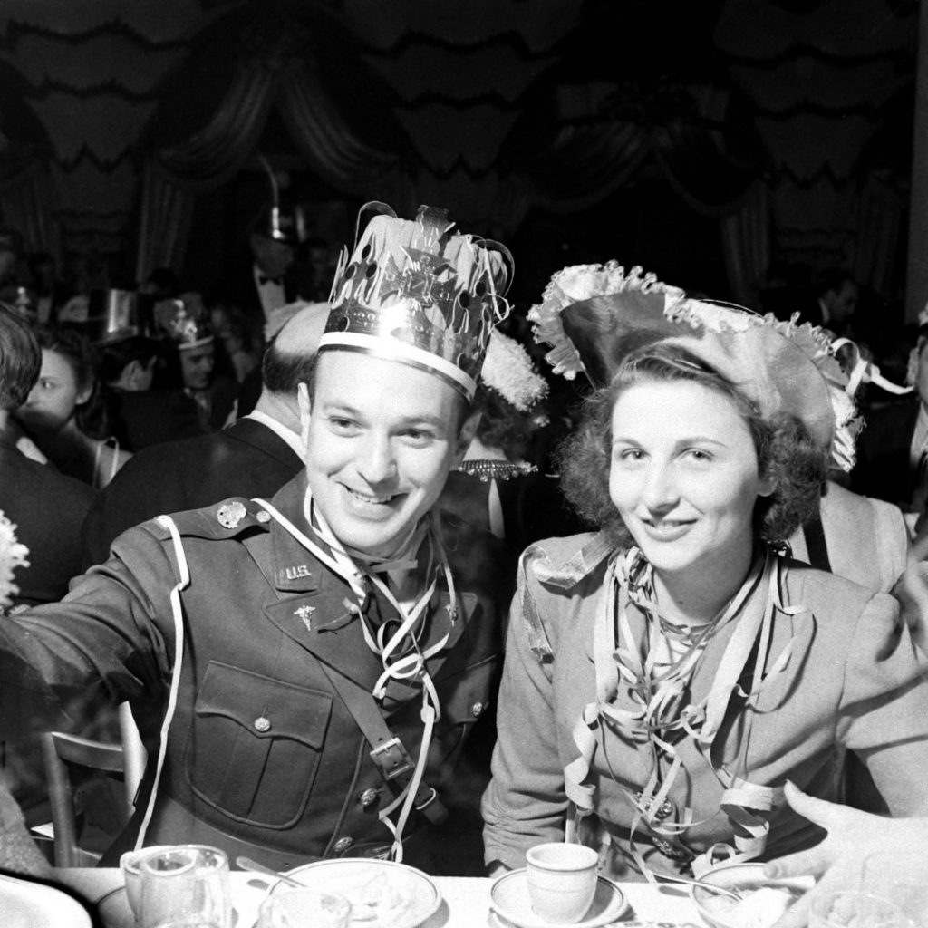 Partiers (a soldier and young woman) in New York City on New Year’s Eve, as 1941 turns to 1942.