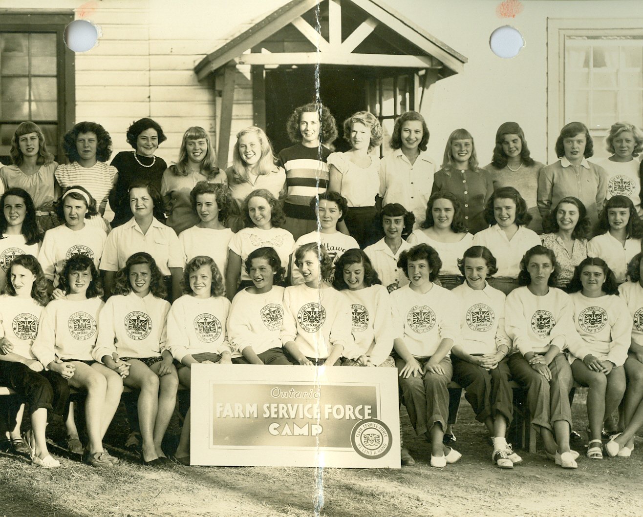 1940s Vintage Photo of young women in Ontario Canada called 'The Farmerettes' at their farming camp in Huttonville. These women helped provide food for the soldiers during WW2. 