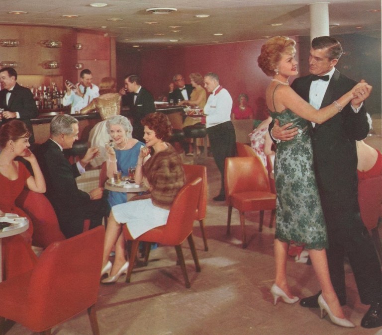 1950s Cocktail/lounge party theme idea as seen in this 1950s / 1960s vintage photo of a party in a cocktail lounge. 