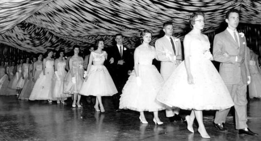 1950s Themed party idea: Sock Hop/ 1950s Dance as seen in this 1950s vintage photo. Looks at those 1950s dresses?!