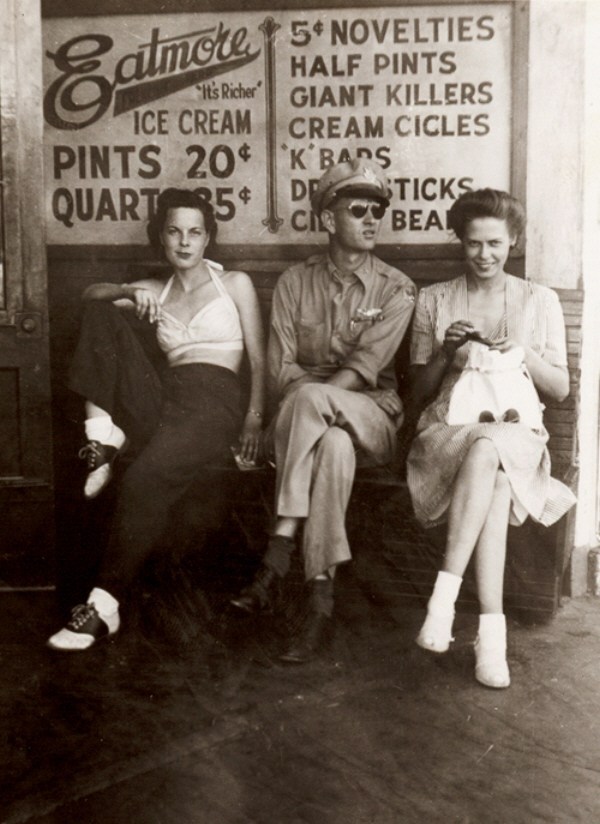 1950s photo of a woman wearing saddle shoes. vintage photo