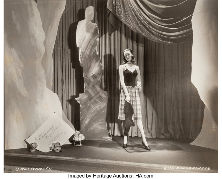 1940s vintage photo of a B. Altman Shop Window Display 1940s College Fashion Vintage Photo featuring a pretty 1940s dress. 