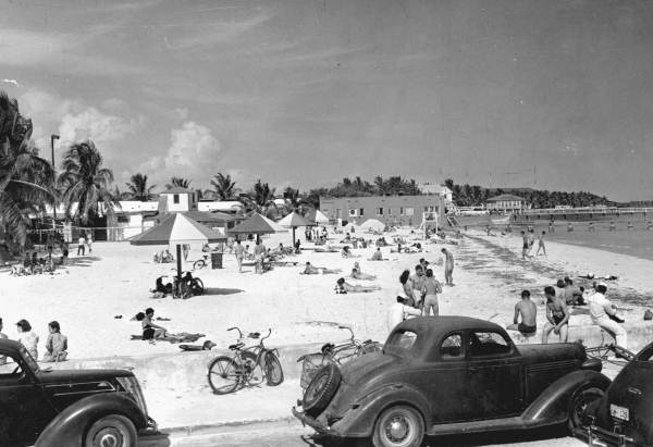 1940s vintage photo: Groups of people spending the day at the beach - Key West, Florida.