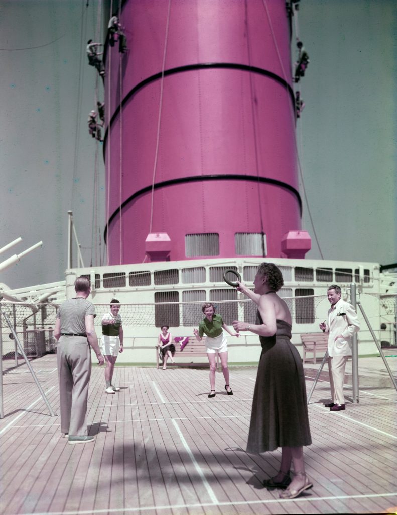 1950s Photo of people playing games on a cruise ship in 1950s fashionsl