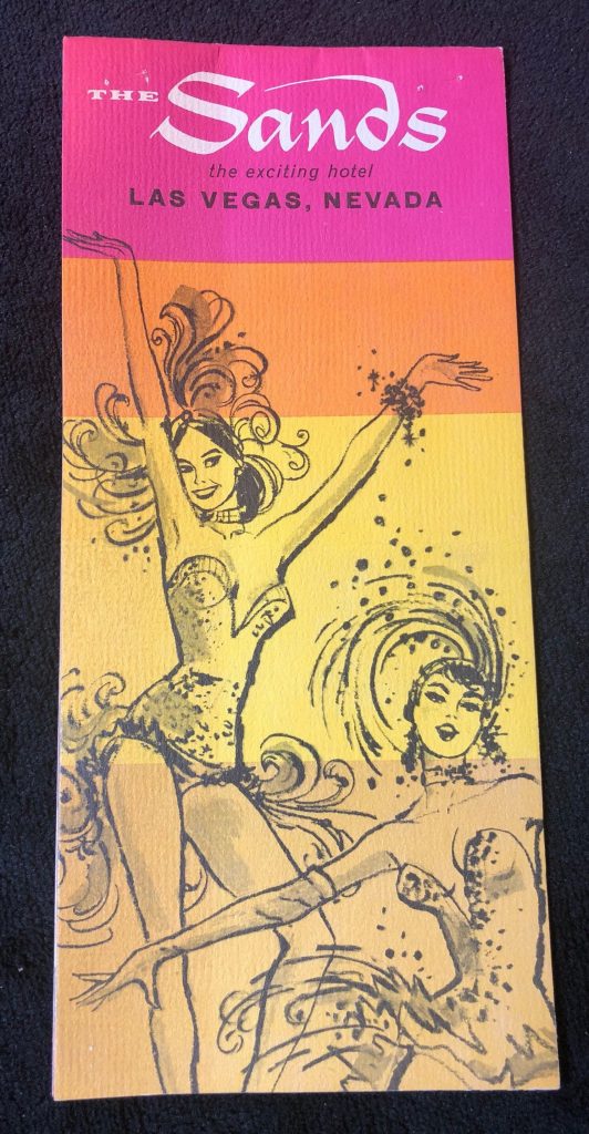 1960s The Sands Hotel and Casino Las Vegas Booklet/Brochure featuring an illustration of showgirls on the cover. 