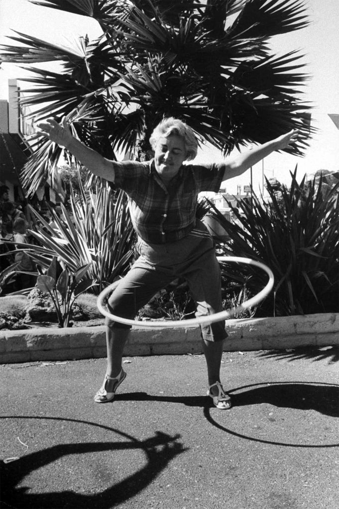 1950s Hula hop Fad women hula hooping 1950s fashion. 1950s vintage image. 