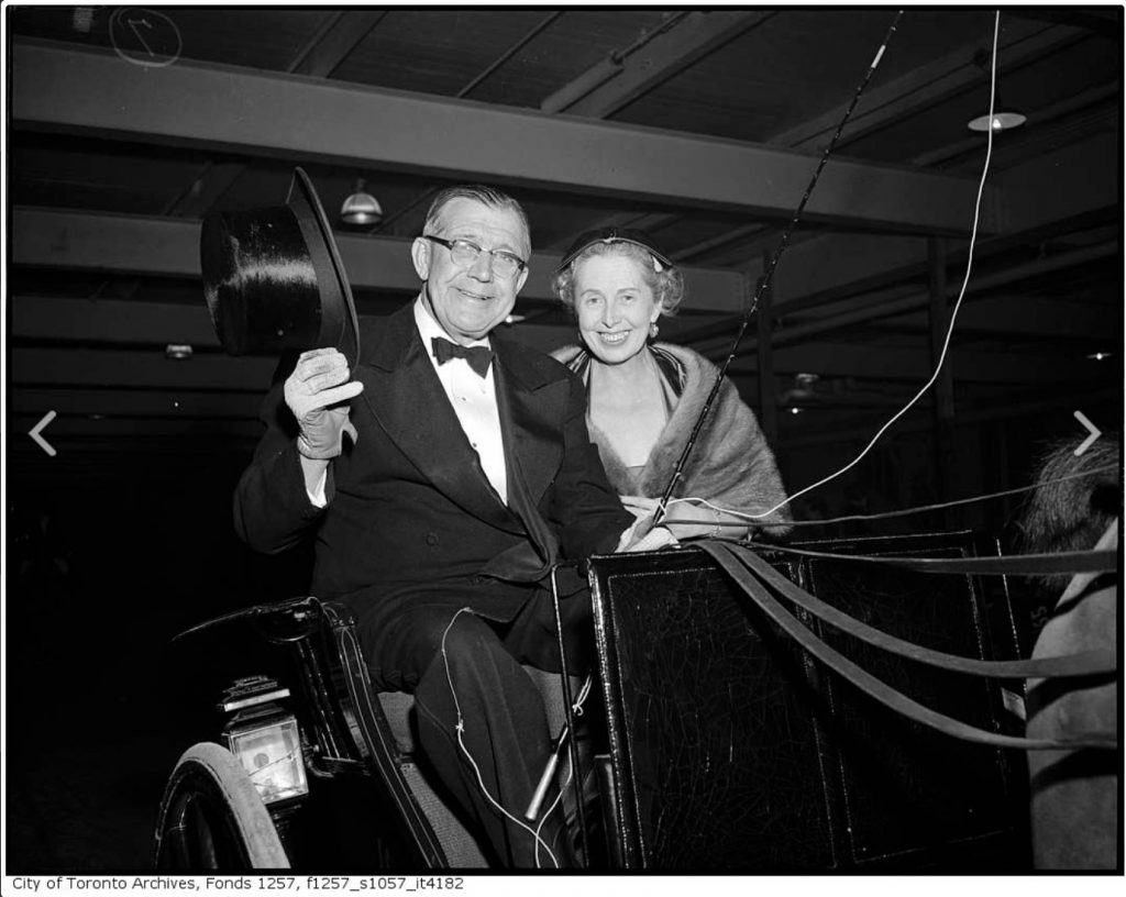 1950s Vintage Photo: J. Lance Rumble of Lawrum Farms, Durham, Ontario, at Royal Winter Fair in buggy with Mrs. Rumble-1950s.