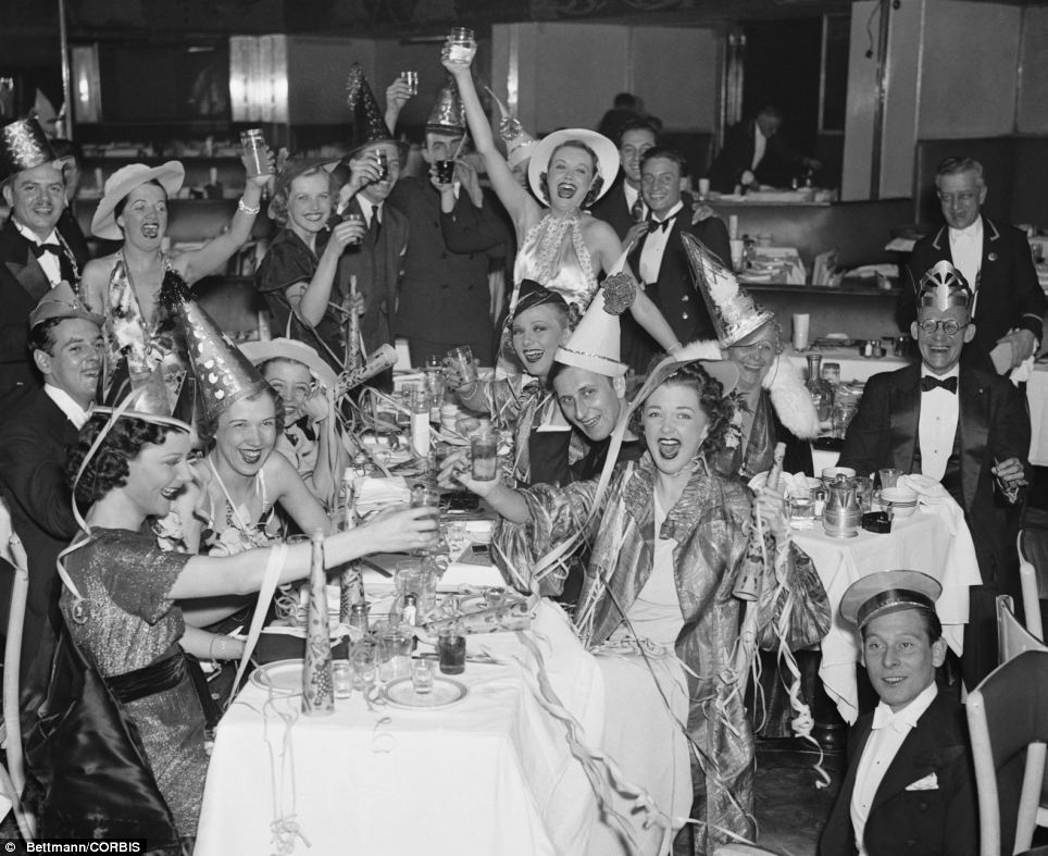 1930s vintage photo: Raise a glass downtown: The New Year to came to the Bowery in 1936 to be greeted by a toast from these downtown folks