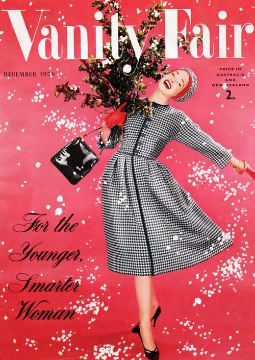 Vanity Fair cover, December 1956 featuring a woman in 1950s dress playing in the snow. 