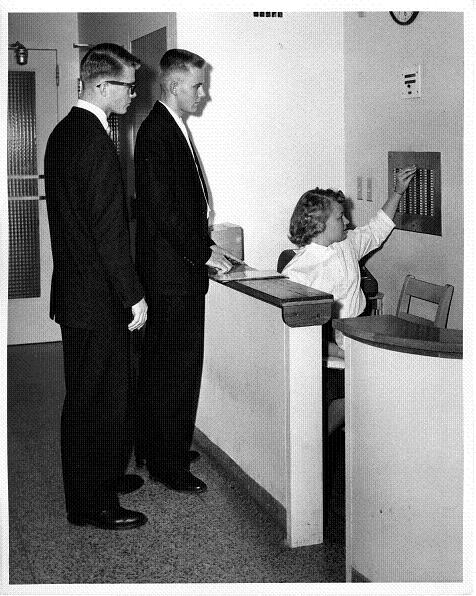 1940s Vintage Photo: Calling for their dates in Brandt Hall, c. late 1940s. Vintage Dating Photo