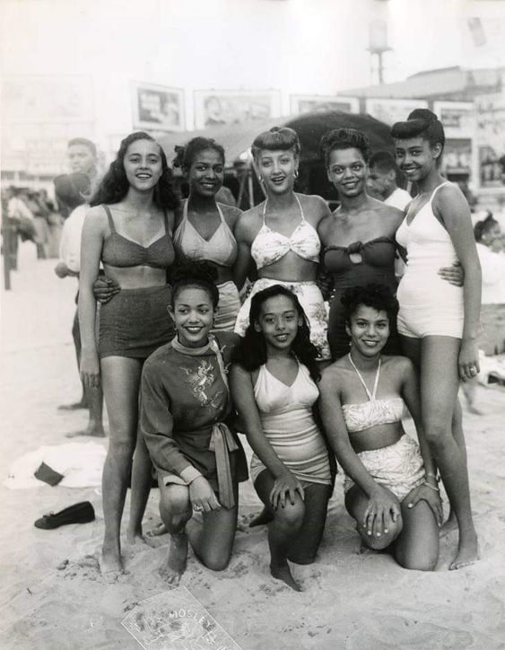 1950s Photo of African American Women posing on the beach in Atlantic city at Chicken Bone Beach in 1950s Swimsuits. 