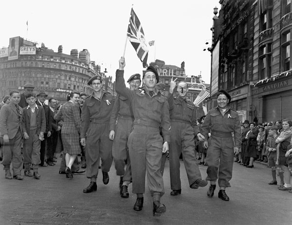 1940s vintage photo of Canadian soldiers celebrating VE-Day, Piccadilly Circus, London, England, May 8, 1945 