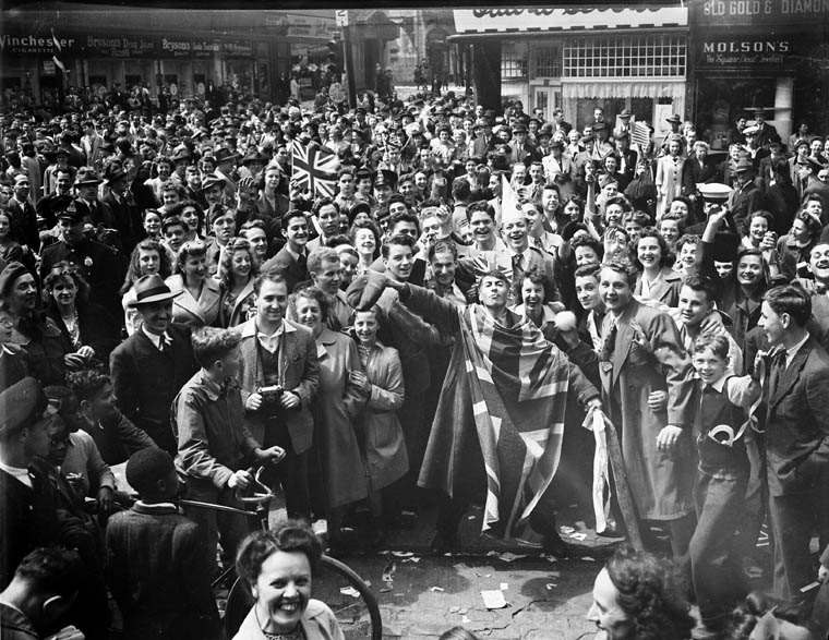 1940s vintage photo of a Crowd celebrating VE-Day, Montréal, Quebec, May 8, 1945