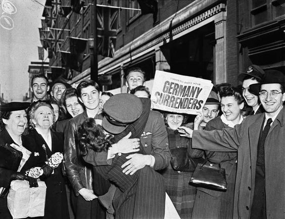 1940s vintage photo: May 7th 1945 picture of VE Day Celebrations in Toronto. Germany Surrenders as seen in the Toronto Star