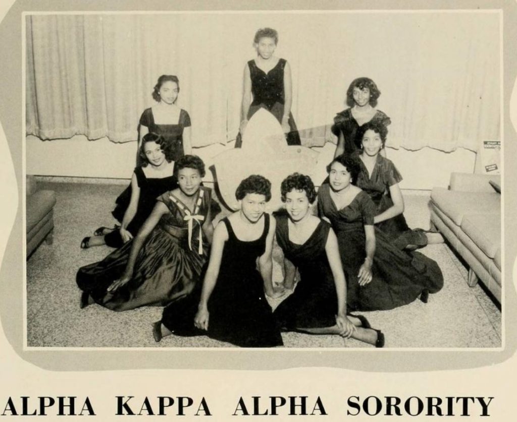 1950s Vintage photo of Black Sorority Sisters - Alpha Kappa Alpha Sorority in 1957. They are all wearing beautiful 1950s dresses. 