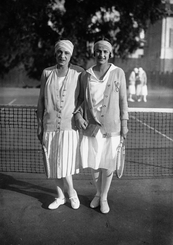 1920s Womens Sportswear vintage photo of 2 women in 1920s outfits / sportswear for their Tennis game. The perfect vintage Tennis Outfit Inspiration