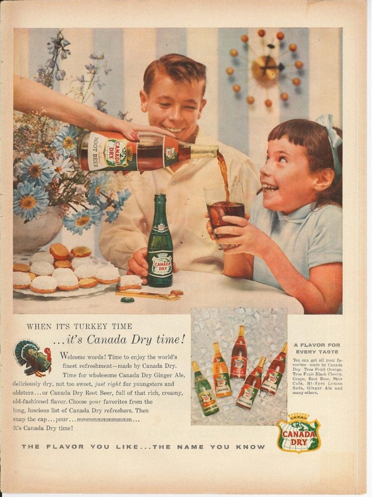 1955 CANADA DRY Ginger Ale Vintage Magazine Advertisement featuring an image of two 1950s kids enjoying a glass of Canada Dry rootbeer and canada dry ginger ale at thanksgiving. 