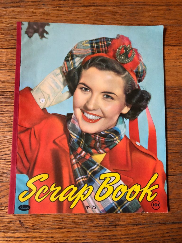 Vintage 1950s Scrapbook with a women’s Face wearing a Scottish Tam, Plaid Scarf and Red Jacket. 