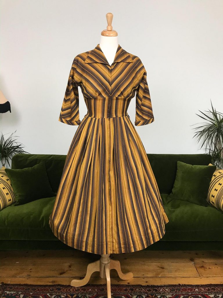 Vintage 1950s zip front chevron dress