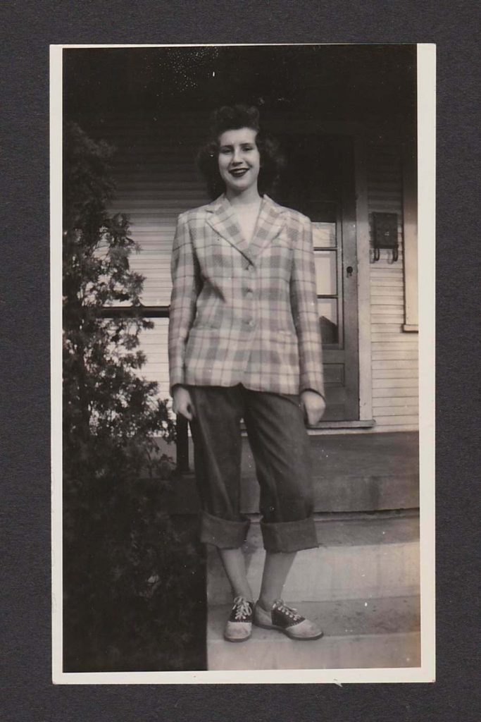 Fall Fashion Look: Plaid menswear jacket as seen on our stylish young woman in this 1940s Photo. I love the rolled up jeans, paired with the jacket and the saddle shoes. Great look!