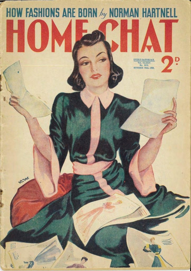 1930s vintage magazine cover from october featuring norman hartnell designs on the cover and an illustration of a woman in a dressing gown, looking at fashion illustrations with a 1930s hairstyle.