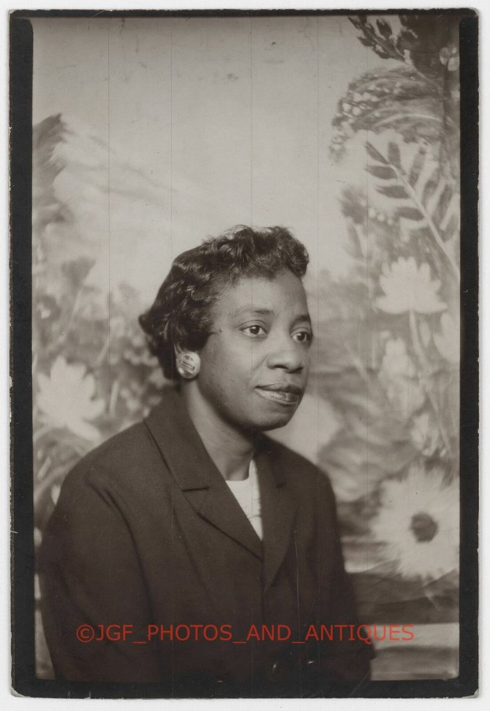 1940s photo booth photo of a pretty Black woman