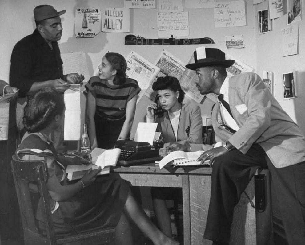 Editorial staff of the "Hill Top", the student paper at Howard University. 1940s vintage photo of black students. 