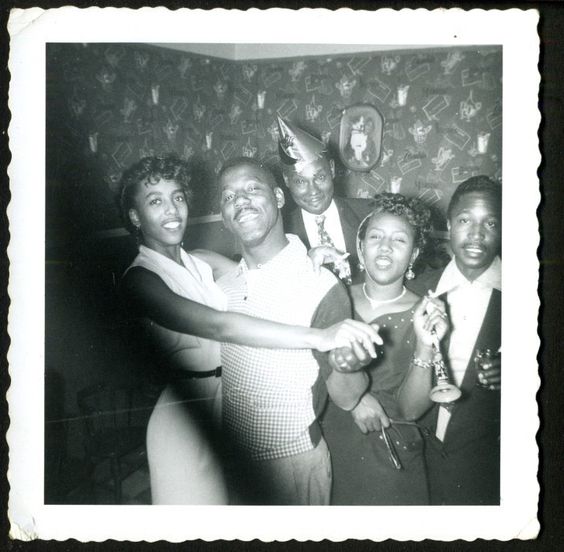 1950s early 1960s vintage photo of Black Men and Black Women celebrating New Years Eve