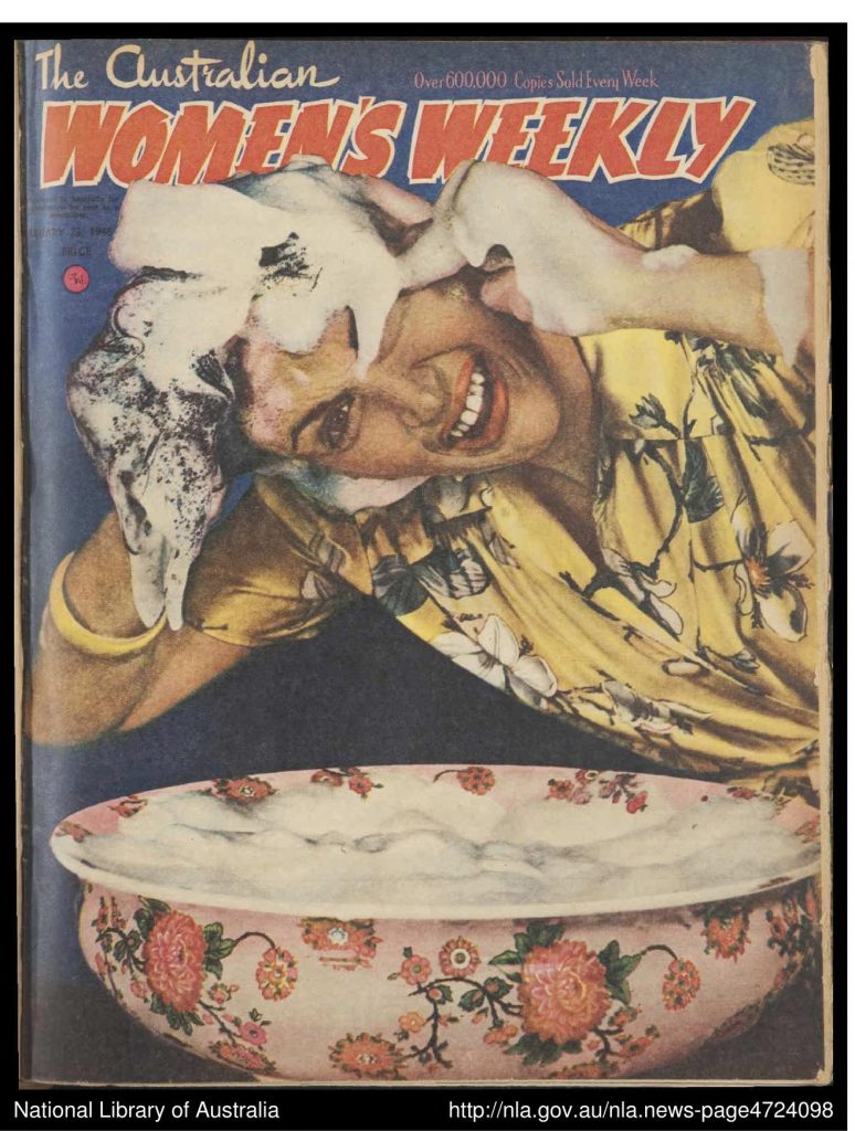 he Australian Women's Weekly 23-02-1946. Image on the cover features a woman washing her hair in a floral bowl wearing a flower housedress or robe. 