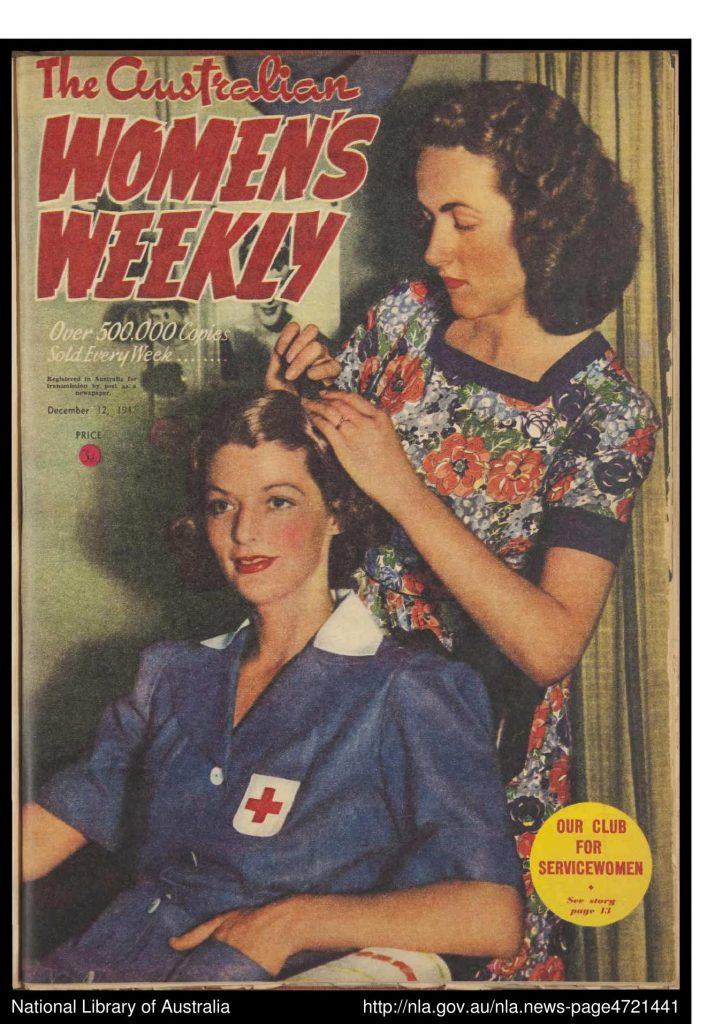 The Australian Women's Weekly 12-12-1942. Cover depicts two service women during WW2 doing their hair. 