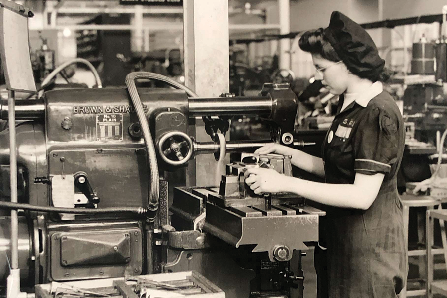 Vintage Photo: 1940s Photo of women working on the homefront in a factory in mississauga at the small arms building making small guns. 