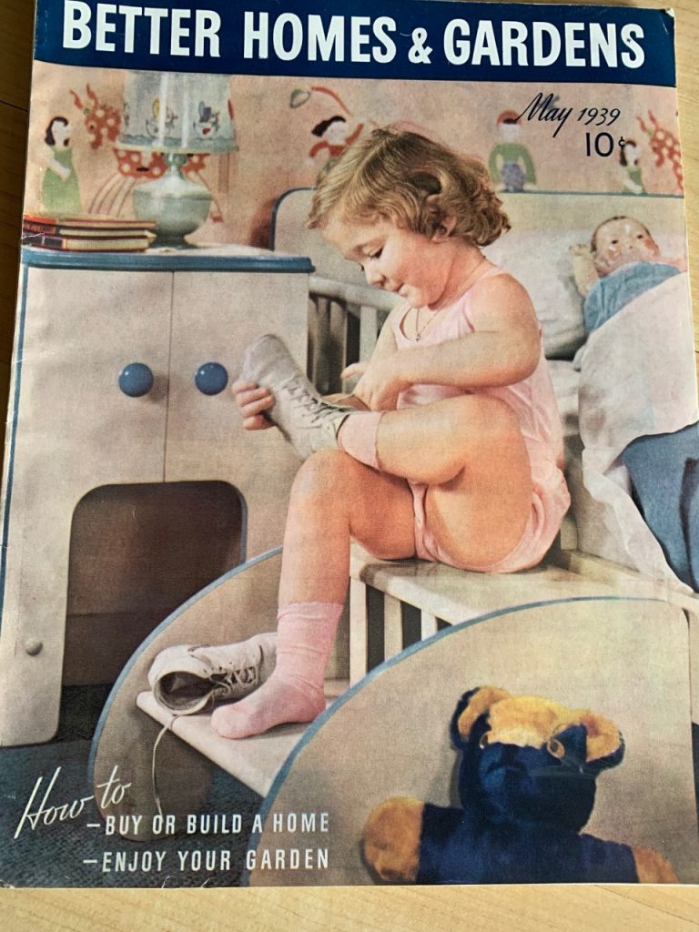 Vintage Magazine-May 1939 Better Homes & Gardens featuring a little girl putting her shoes on in her bedroom. 