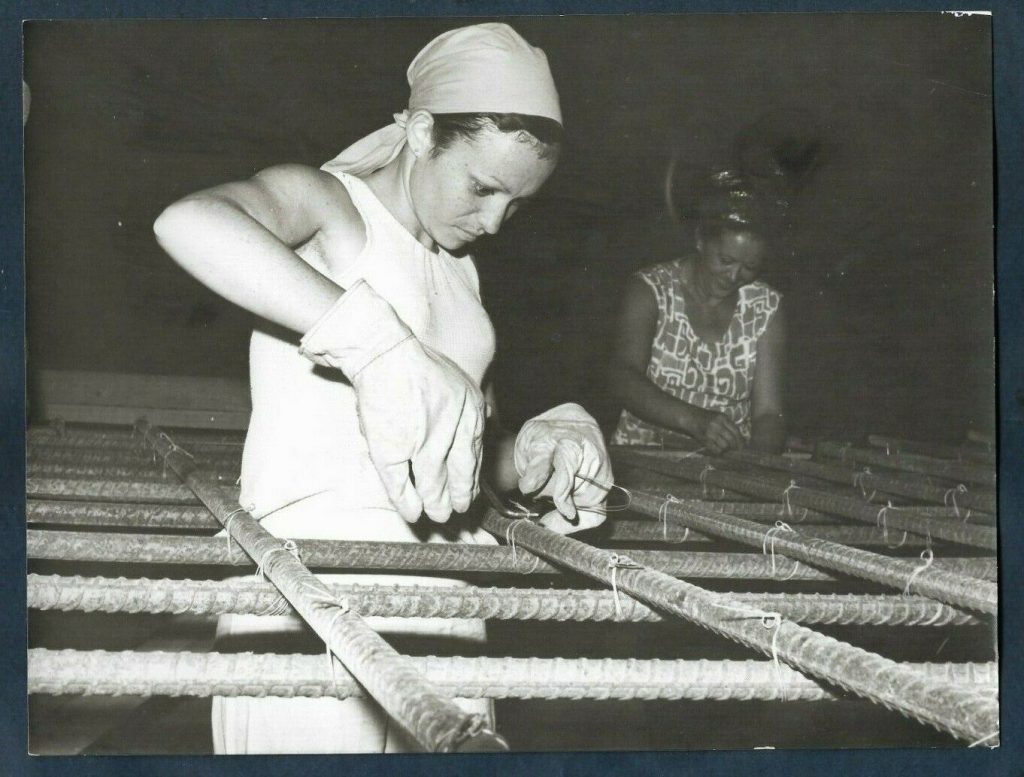 1960s vintage photo of 2 women in Cuba Tying Rebar