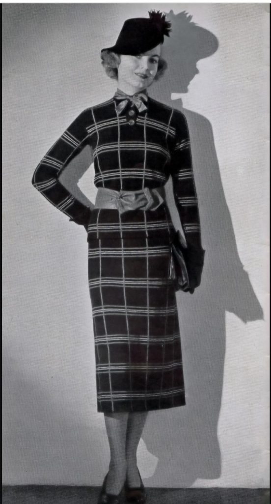 1930s plaid knitted dress or a 1930s plaid sweater and 1930s plaid skirt with a cute 1930s hat. 