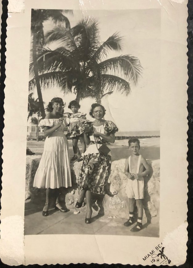 1950 Vintage Photo of a family on vacation in Miami Beach Florida in 1950s Summer Fashions with 2 kids. 