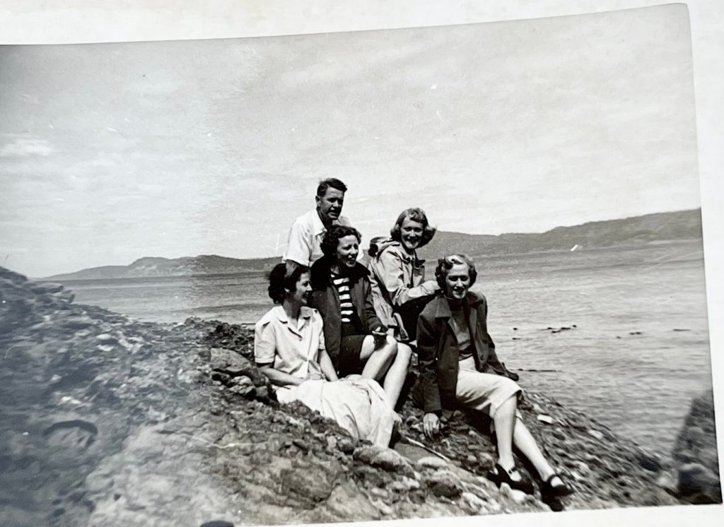 1950s vintage photo of a group of women and one man on the shores of British Columbia on Vacation in 1950s Fashions