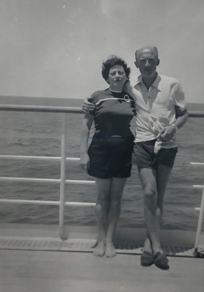 1950s vintage photo of a couple on a cruise ship. 