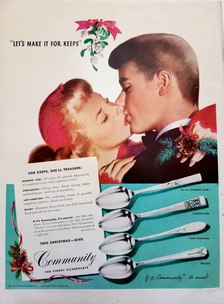 1947 Community Silverware Vintage Advertisement featuring a couple kissing under the mistletoe