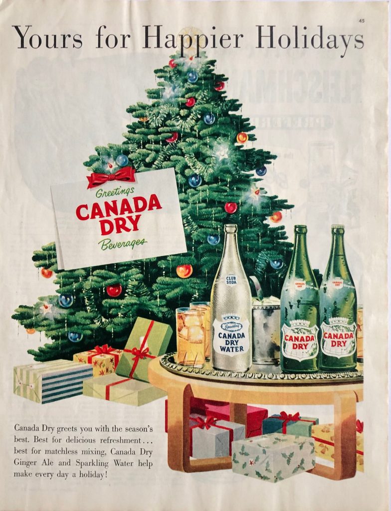 1951 Canada Dry Christmas Ad featuring bottles of Canada Dry around a Christmas Tree. The perfect Christmas Drink. 