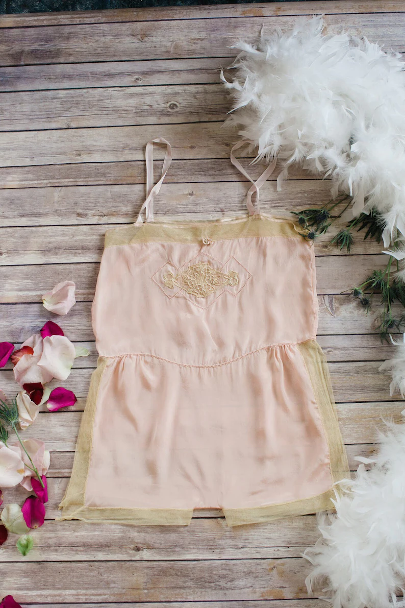 1920s Fashion: Vintage 1920s blush pink silk lingerie teddy shorts combination slip with cream mesh trim, embroidery, hemstitching, and side slits