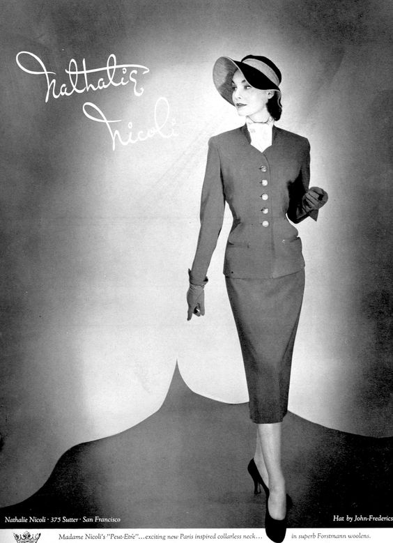 1950s Fashion Ad: Sherry Nelms in Forstmann wool suit by Nathalie Nicoli, hat by John Frederics, Vogue, August 1, 1951