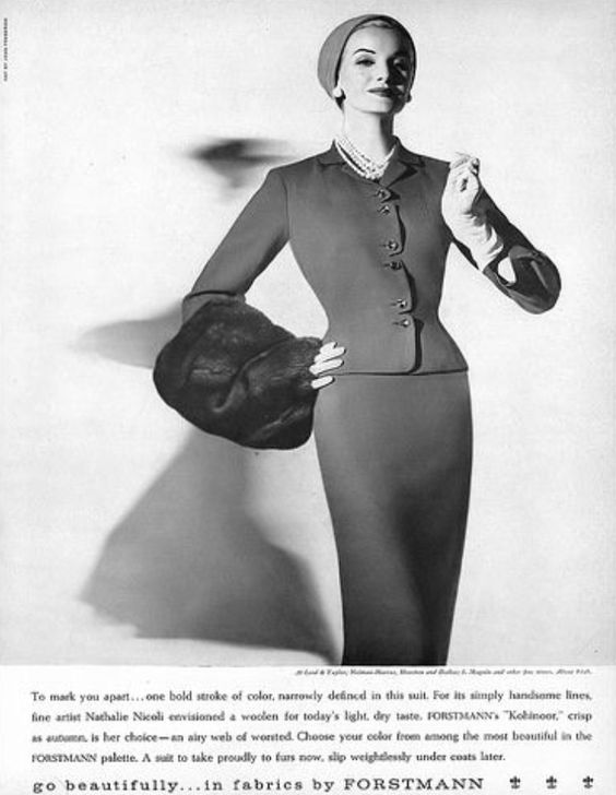 1950s Fashion: Sunny Harnett in simple, elegant Forstmann's worsted suit designed by Nathali Nicoli, hat by John-Frederics, Harper's Bazaar, August 1956