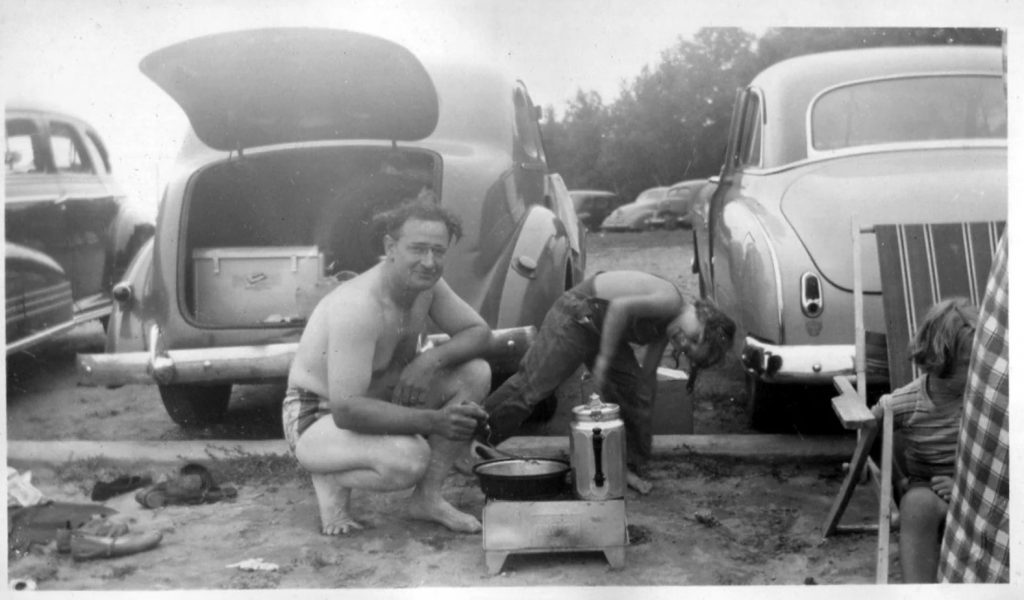 Late 1940s photo of a Dad Cooking Breakfast at the Beach Car Camping