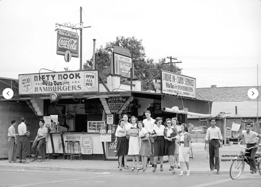 1942 Nifty Nook Diner / Malt Shop. Phoenix, Arizona. Super 1940s "teenager" fashions on display in this image. 